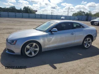 2015 Audi A5 Premium with VIN WAUCFAFR7FA015473, listed as a Copart auction lot 68797774 with 75,574 mi miles and Salvage Title. Bid and sale history available at carsss.com. Image 1.