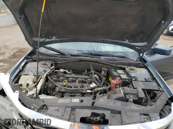 2012 Ford Fusion SE with VIN 3FAHP0HA2CR124891, listed as a Copart auction lot 76113714 with 184,628 mi miles and Salvage title. Bid and sale history available at DreamBid. Image 11.