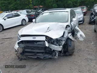 2017 Ford Fusion Titanium with VIN 3FA6P0K96HR105127, listed as a IAAI auction lot 39351701 with 103,295 mi miles. Bid and sale history available at carsss.com. Image 6.