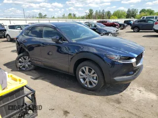 2025 Mazda CX-30 S Premium with VIN 3MVDMBDM5SM807451, listed as a Copart auction lot 56186075 with 379 mi miles and Salvage title. Bid and sale history available at DreamBid. Image 4.