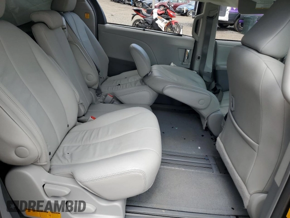 2012 Toyota Sienna XLE AAS with VIN 5TDYK3DC6CS248919, listed as a Copart auction lot 55470505 with 79,761 mi miles and Salvage title. Bid and sale history available at DreamBid. Image 11.