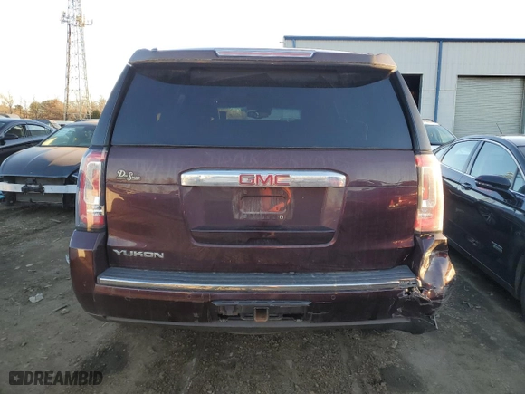 2017 GMC Yukon Denali with VIN 1GKS2CKJ4HR316877, listed as a Copart auction lot 82426694 with 129,239 mi miles and Salvage Title. Bid and sale history available at carsss.com. Image 6.