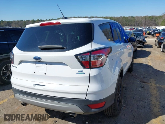 2017 Ford Escape SE with VIN 1FMCU0GD9HUE77231, listed as a IAAI auction lot 41776899 with 71,097 mi miles. Bid and sale history available at carsss.com. Image 4.