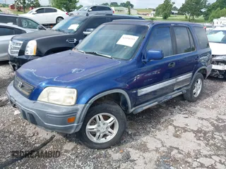 1999 Honda CR-V EX z VIN JHLRD1867XC073159, wystawiony jako IAAI lot #42494333 z przebiegiem 278 386 mil mil oraz . Historia ofert i sprzedaży dostępna na DreamBid. Obrazek 2.