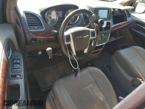2012 Chrysler Town & Country Touring L with VIN 2C4RC1CG1CR193122, listed as a Copart auction lot 49162105 with 166,223 mi miles and Salvage Title. Bid and sale history available at DreamBid. Image 8.