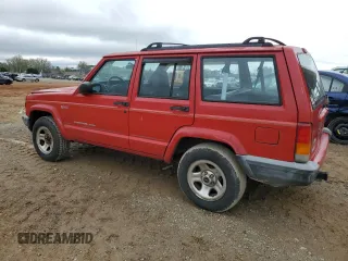 1999 Jeep Cherokee Sport with VIN 1J4FT68S2XL580915, listed as a Copart auction lot 50374875 with 286,276 mi miles and Salvage Title. Bid and sale history available at carsss.com. Image 2.