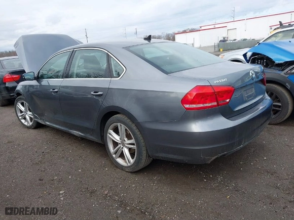 2014 Volkswagen Passat SE w/Sunroof with VIN 1VWBT7A3XEC069637, listed as a IAAI auction lot 41802276 with 119,945 mi miles. Bid and sale history available at carsss.com. Image 3.