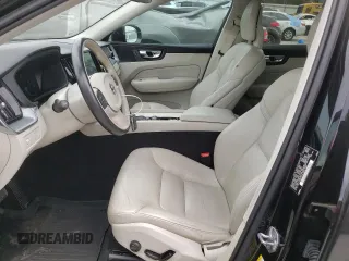 2018 Volvo XC60 Momentum with VIN LYV102RK1JB073418, listed as a Copart auction lot 73763614 with 64,692 mi miles and Salvage Title. Bid and sale history available at DreamBid. Image 7.