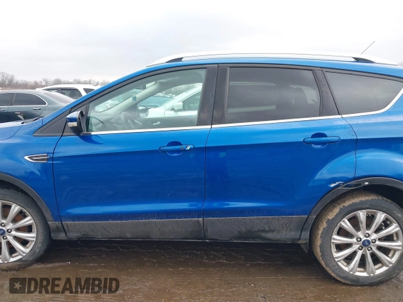 2017 Ford Escape Titanium with VIN 1FMCU9JD8HUA59000, listed as a IAAI auction lot 41559788 with 90,319 mi miles. Bid and sale history available at carsss.com. Image 14.