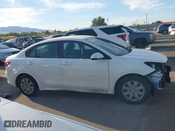 2022 Kia Rio S with VIN 3KPA24AD4NE498600, listed as a IAAI auction lot 40527357 with 59,614 mi miles and . Bid and sale history available at carsss.com. Image 13.