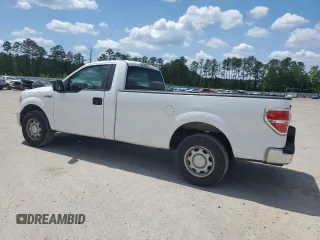 2014 Ford F-150 XL with VIN 1FTNF1CF2EKD21155, listed as a Copart auction lot 54897075 with 156,681 mi miles and Salvage title. Bid and sale history available at DreamBid. Image 2.