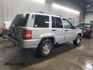 1998 Jeep Grand Cherokee Laredo with VIN 1J4GZ48S3WC269693, listed as a Copart auction lot 85026074 with 308,791 mi miles and Salvage Title. Bid and sale history available at carsss.com. Image 3.