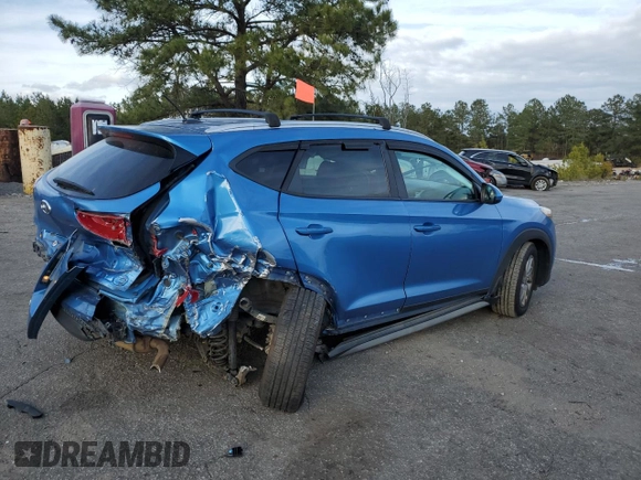 2017 Hyundai Tucson SE with VIN KM8J33A4XHU595101, listed as a Copart auction lot 47773465 with 120,430 mi miles and Salvage Title. Bid and sale history available at DreamBid. Image 3.