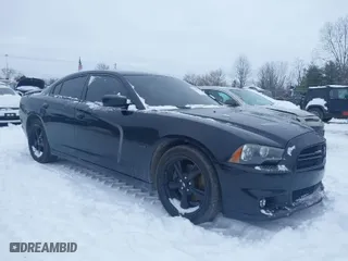 2014 Dodge Charger RT Plus with VIN 2C3CDXCT2EH134970, listed as a IAAI auction lot 41238430 with 148,066 mi miles. Bid and sale history available at carsss.com. Image 1.
