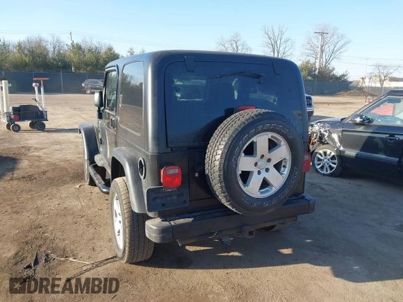 2006 Jeep Wrangler Sport with VIN 1J4FA49SX6P733671, listed as a IAAI auction lot 41779611 with 189,701 mi miles and . Bid and sale history available at carsss.com. Image 3.