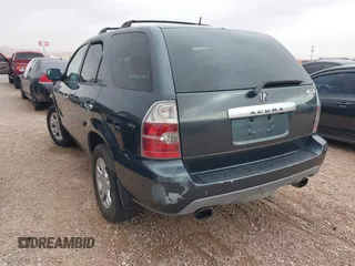 2006 Acura MDX Touring w/Navi with VIN 2HNYD18876H523408, listed as a IAAI auction lot 41756670 with 219,796 mi miles. Bid and sale history available at carsss.com. Image 3.