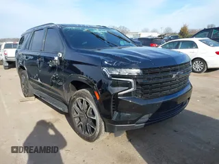 2023 Chevrolet Tahoe RST z VIN 1GNSKRKD2PR279732, wystawiony jako IAAI lot #41403578 z przebiegiem 19 483 mil mil oraz . Historia ofert i sprzedaży dostępna na DreamBid. Obrazek 1.