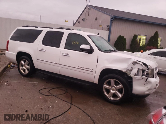 2009 Chevrolet Suburban LTZ with VIN 1GNFC36019J122990, listed as a Copart auction lot 79067174 with 167,632 mi miles and Salvage title. Bid and sale history available at DreamBid. Image 4.