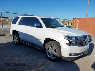 2016 Chevrolet Tahoe LTZ with VIN 1GNSKCKC0GR203348, listed as a IAAI auction lot 42220438 with 108,657 mi miles and . Bid and sale history available at DreamBid. Image 1.