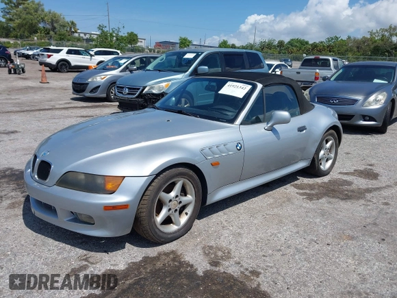 1997 BMW 3 Series 2.8L with VIN 4USCJ3326VLC03034, listed as a IAAI auction lot 41921342 with 155,896 mi miles. Bid and sale history available at carsss.com. Image 2.