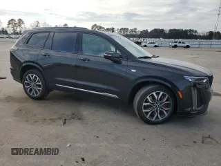 2023 Cadillac XT6 AWD Sport with VIN 1GYKPHRS3PZ150630, listed as a Copart auction lot 43557595 with 54,299 mi miles and Salvage title. Bid and sale history available at DreamBid. Image 4.