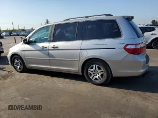 2007 Honda Odyssey EX-L z VIN 5FNRL38697B039741, wystawiony jako Copart lot #56868365 z przebiegiem 135 742 mil mil oraz Czysty tytuł • Clean title. Historia ofert i sprzedaży dostępna na DreamBid. Obrazek 2.