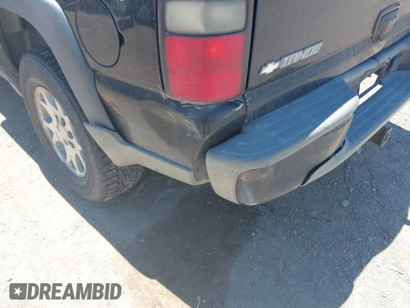 2005 Chevrolet Tahoe LT z VIN 1GNEK13T35R116833, wystawiony jako IAAI lot #42508302 z przebiegiem 254 759 mil mil oraz . Historia ofert i sprzedaży dostępna na DreamBid. Obrazek 6.