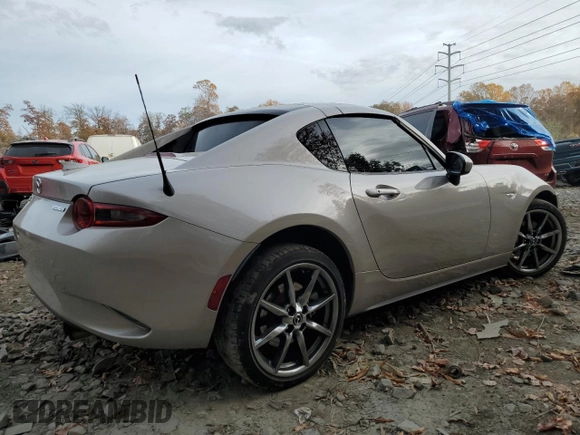 2023 Mazda MX-5 Miata Grand Touring with VIN JM1NDAM70P0552860, listed as a Copart auction lot 79240314 with 16,173 mi miles and Salvage title. Bid and sale history available at DreamBid. Image 3.