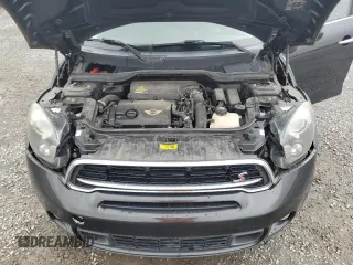 2015 MINI Countryman S with VIN WMWZC3C51FWP52784, listed as a Copart auction lot 58366455 with 78,432 mi miles and Salvage title. Bid and sale history available at DreamBid. Image 11.