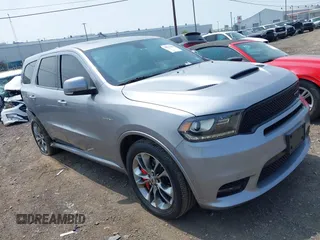 2020 Dodge Durango R/T with VIN 1C4SDJCT5LC114927, listed as a IAAI auction lot 42483198 with 66,548 mi miles and . Bid and sale history available at DreamBid. Image 1.