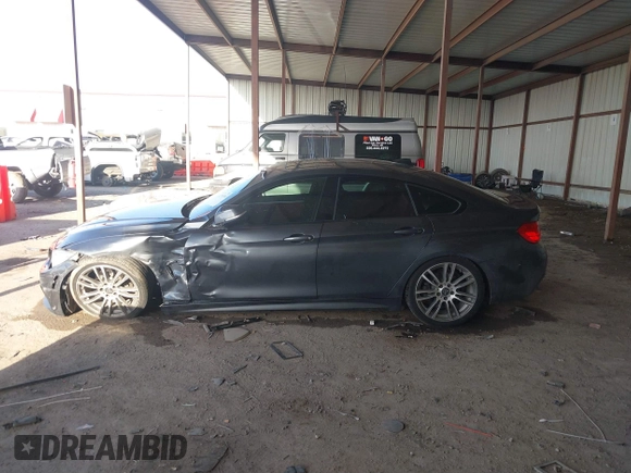 2015 BMW 4 Series 428i with VIN WBA4A5C54FG051307, listed as a IAAI auction lot 41774596 with 126,852 mi miles and . Bid and sale history available at carsss.com. Image 14.