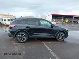 2021 Ford Escape SE z VIN 1FMCU0G61MUA15936, wystawiony jako IAAI lot #41725241 z przebiegiem 48 865 mil mil oraz . Historia ofert i sprzedaży dostępna na DreamBid. Obrazek 13.