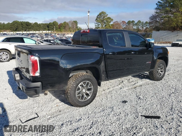 2022 GMC Canyon 4WD AT4 w/Cloth with VIN 1GTG6FEN2N1240091, listed as a Copart auction lot 85764964 with 25,881 mi miles and Salvage Title. Bid and sale history available at carsss.com. Image 3.
