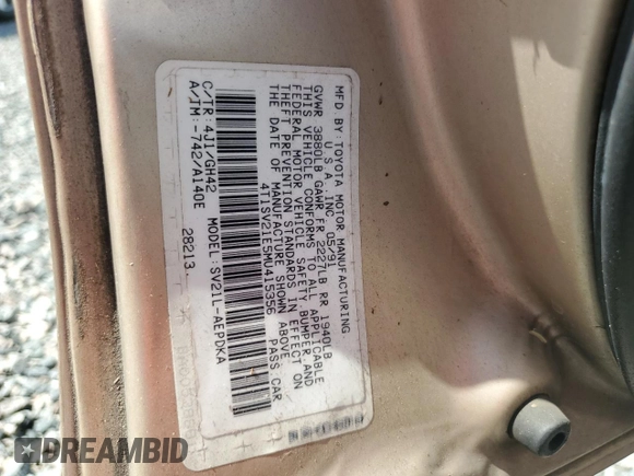 1991 Toyota Camry DLX z VIN 4T1SV21E5MU415356, wystawiony jako Copart lot #74465914 z przebiegiem 74 592 mil mil oraz Szkoda całkowita • Salvage title. Historia ofert i sprzedaży dostępna na DreamBid. Obrazek 13.