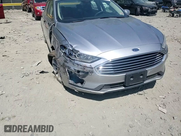 2020 Ford Fusion SE z VIN 3FA6P0LU4LR222006, wystawiony jako Copart lot #55614365 z przebiegiem 58 297 mil mil oraz Szkoda całkowita • Salvage title. Historia ofert i sprzedaży dostępna na DreamBid. Obrazek 13.