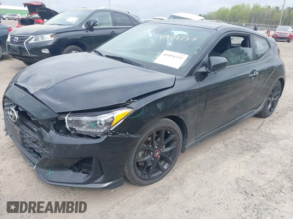 2019 Hyundai Veloster Turbo z VIN KMHTH6AB3KU020159, wystawiony jako IAAI lot #41954737 z przebiegiem 152 070 mil mil oraz . Historia ofert i sprzedaży dostępna na DreamBid. Obrazek 19.
