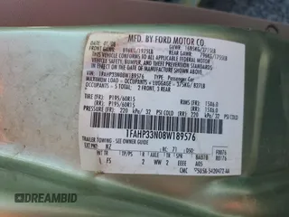 2008 Ford Focus SE z VIN 1FAHP33N08W189576, wystawiony jako Copart lot #54924705 z przebiegiem Nie podano mil oraz Szkoda całkowita • Salvage title. Historia ofert i sprzedaży dostępna na DreamBid. Obrazek 12.