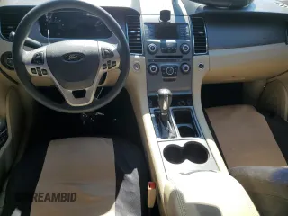2014 Ford Taurus SE with VIN 1FAHP2D8XEG112805, listed as a Copart auction lot 48975265 with 127,730 mi miles and Salvage Title. Bid and sale history available at DreamBid. Image 8.