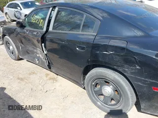 2013 Dodge Charger Police with VIN 2C3CDXAG5DH546384, listed as a IAAI auction lot 42021401 with 154,637 mi miles and . Bid and sale history available at carsss.com. Image 6.