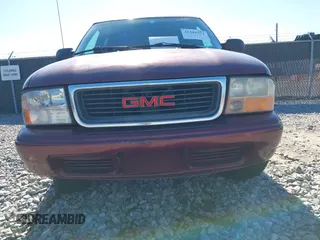 2001 GMC Jimmy SL with VIN 1GKCS13W012143344, listed as a IAAI auction lot 41385552 with 216,127 mi miles. Bid and sale history available at carsss.com. Image 13.
