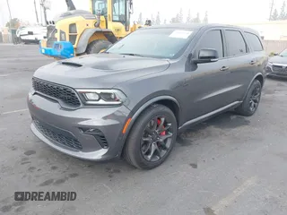 2023 Dodge Durango SRT 392 Premium z VIN 1C4SDJGJ2PC692935, wystawiony jako IAAI lot #41029734 z przebiegiem 7 191 mil mil oraz . Historia ofert i sprzedaży dostępna na DreamBid. Obrazek 2.