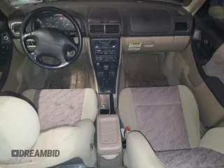 1999 Subaru Forester L with VIN JF1SF6351XH717087, listed as a Copart auction lot 85509274 with 59,695 mi miles and Salvage Title. Bid and sale history available at carsss.com. Image 8.