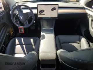 2024 Tesla Model Y Long Range с VIN 7SAYGDEEXRF032028, выставлен на аукционе Copart как лот 47128085 с пробегом 8 607 миль миль и Списание • Salvage title. История ставок и продаж доступна на DreamBid. Изображение 8.