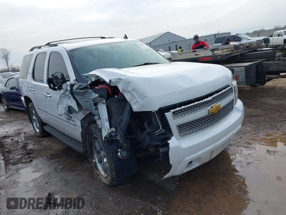 2009 Chevrolet Tahoe LTZ with VIN 1GNFK33079R293963, listed as a IAAI auction lot 41662695 with 185,408 mi miles and . Bid and sale history available at DreamBid. Image 1.