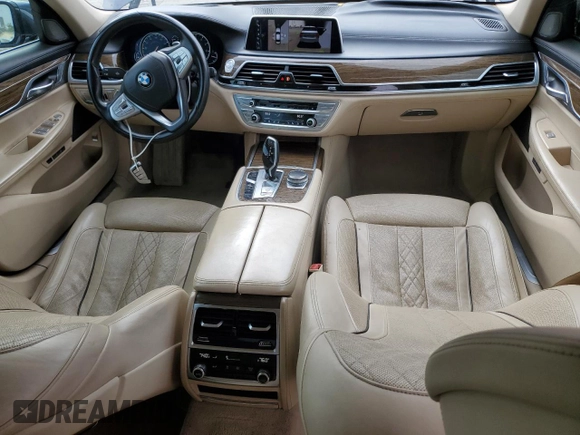 2016 BMW 7 Series 740i with VIN WBA7E2C51GG546677, listed as a Copart auction lot 63455445 with 106,553 mi miles and Salvage title. Bid and sale history available at DreamBid. Image 8.