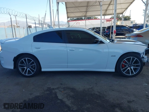 2023 Dodge Charger R/T with VIN 2C3CDXCT1PH651230, listed as a IAAI auction lot 41656860 with 11,817 mi miles and . Bid and sale history available at DreamBid. Image 14.