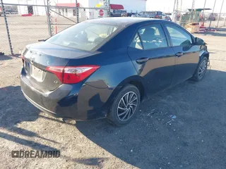 2019 Toyota Corolla L with VIN 2T1BURHE6KC188047, listed as a IAAI auction lot 41695485 with 81,908 mi miles. Bid and sale history available at carsss.com. Image 4.