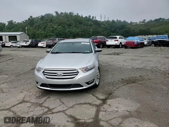 2014 Ford Taurus Limited z VIN 1FAHP2F82EG115503, wystawiony jako Copart lot #64836755 z przebiegiem 111 691 mil mil oraz Szkoda całkowita • Salvage title. Historia ofert i sprzedaży dostępna na DreamBid. Obrazek 13.