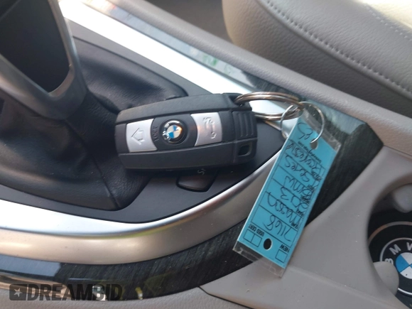 2013 BMW 1 Series 135i with VIN WBAUN7C57DVM28236, listed as a IAAI auction lot 41900116 with 38,876 mi miles and . Bid and sale history available at carsss.com. Image 11.