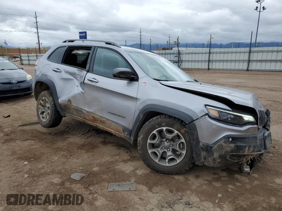2021 Jeep Cherokee Trailhawk with VIN 1C4PJMBX2MD143446, listed as a Copart auction lot 55166945 with 83,841 mi miles and Salvage title. Bid and sale history available at DreamBid. Image 4.